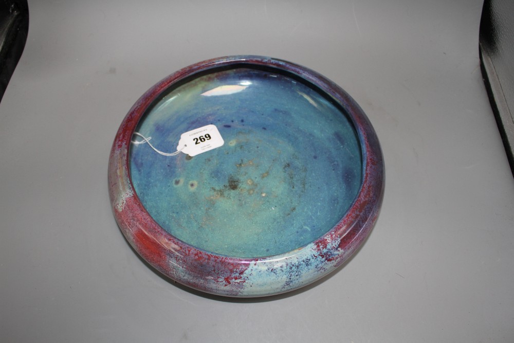 A Royal Doulton Titanian ware flambe bowl, c.1910, of compressed globular form, inspired by Chinese Jun ware glazes,